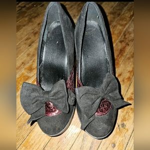 Chunky black heals with a flash of red size 9